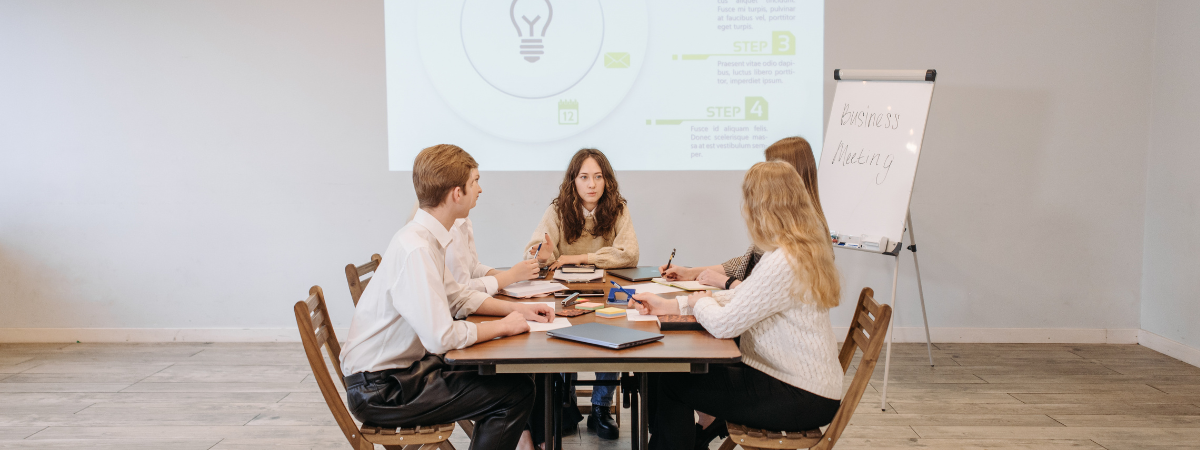 employees at a meeting 