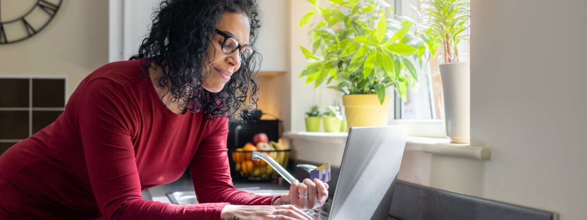 lady paying bill on laptop