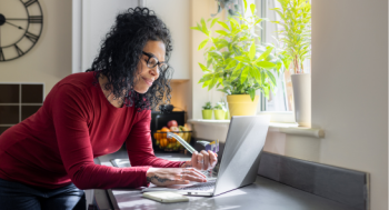 lady paying bill on laptop